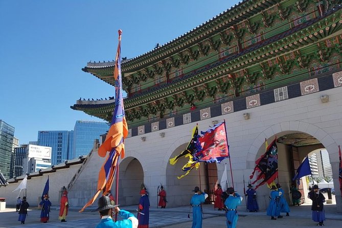 Best Walking Tour to Gyeongbok Palace Bukchon Hanok Village - Entering Gyeongbokgung Palace and watching the guard change