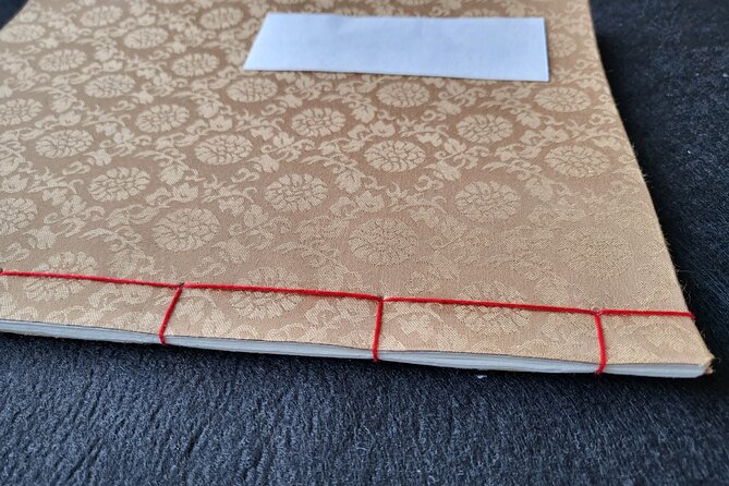 Create a Handmade Traditional Korean Notebook in Insadong - Folding paper into a Korean keepsake