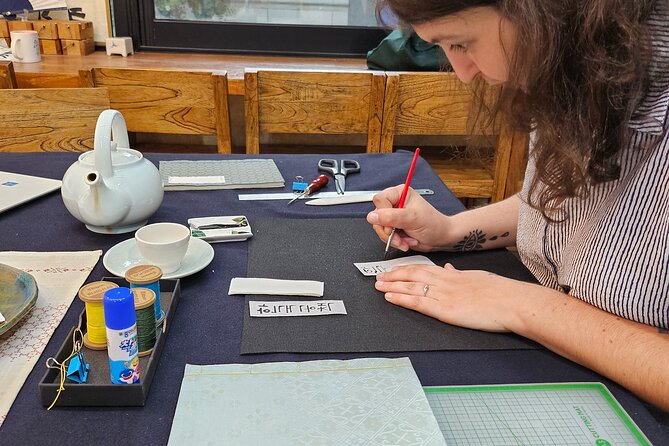 Create a Handmade Traditional Korean Notebook in Insadong - Writing your name in Korean characters