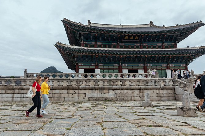 Highlights & Hidden Gems With Locals: Best of Seoul Private Walking Tour - Entering Gyeongbokgung Palace