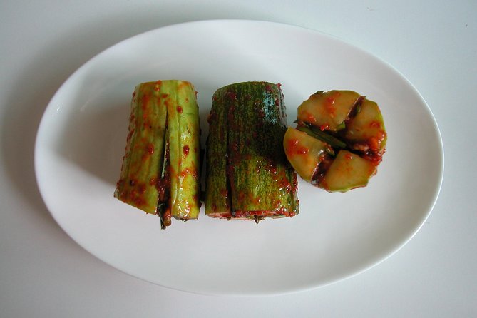 Korean Kimchi Making Day Experience with a Local Market Tour - The meal: kimchi with pork, tofu, and makgeolli