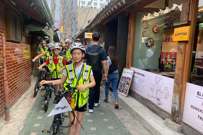 Market Food Tour & Evening E-bike Ride in Seoul - Sewoon Arcade, a 1970s Time Capsule