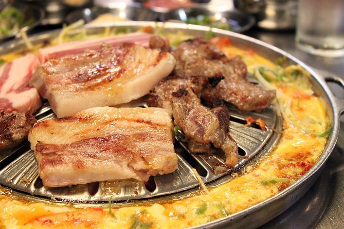 Seoul: Anthony Bourdain-Inspired BBQ and Pub Experience - Stop two: pancakes, tempura, and a lesson in Korean alcohol