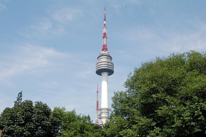 Seoul City Sightseeing Tour Including Gyeongbokgung Palace, N Seoul Tower, and Namsangol Hanok Village - Gwanghwamun Gate brings a traditional ceremony into the morning