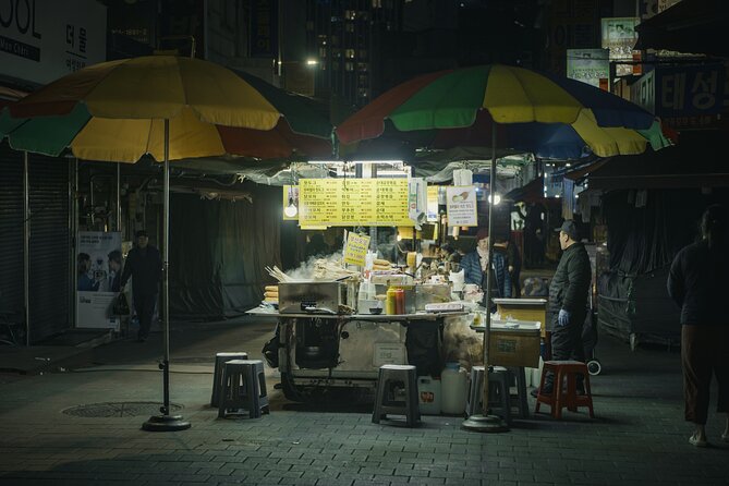 Seoul History Tour: Dark Past & Market Street Flavors - Sungnyemun Gate and Seoul’s changing public face